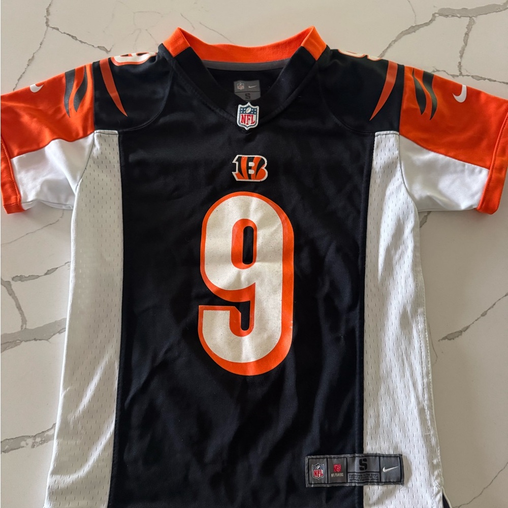 Nike Kids Black and Orange Sports Jersey